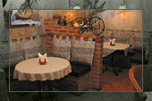 Wnętrze restauracji Dolce-Vita w Bydgoszczy - zaciszny stolik w rou sali głównej
                    